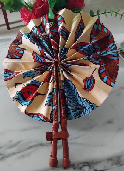 Éventail africain rond · wax artisanal · fait main Côte d'Ivoire · monture similicuir